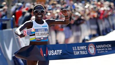 ATLANTA, GEORGIA - FEBRUARY 29:  Aliphine Tiliamuk reacts as she crosses the finish line to win the Women's U.S. Olympic marathon team trials on February 29, 2020 in Atlanta, Georgia. (Photo by Kevin C. Cox/Getty Images)